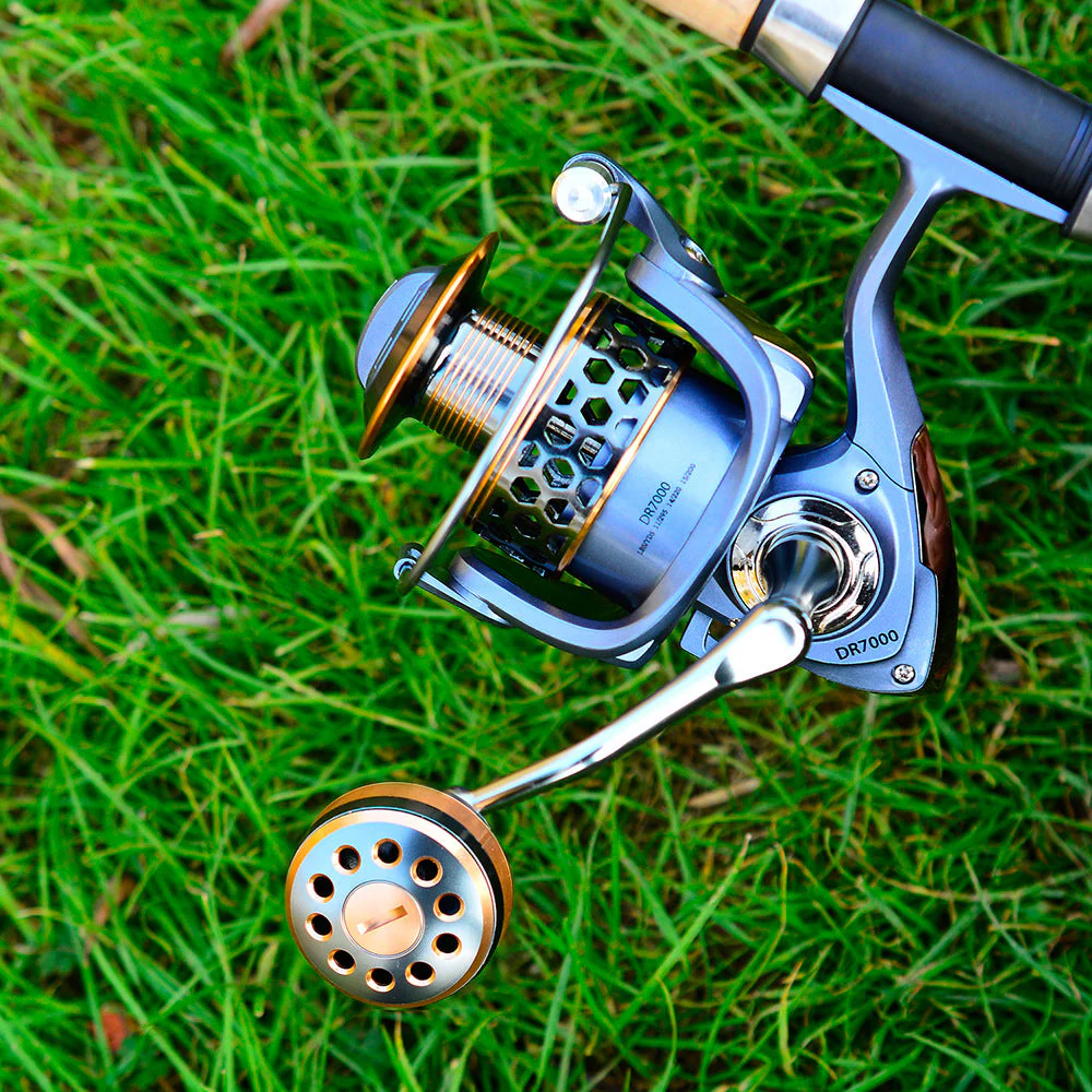 DR7000 Metal Spinning Fishing Reel Left/Right Retrieve 5.2:1 12 Ball Bearings - Image 3